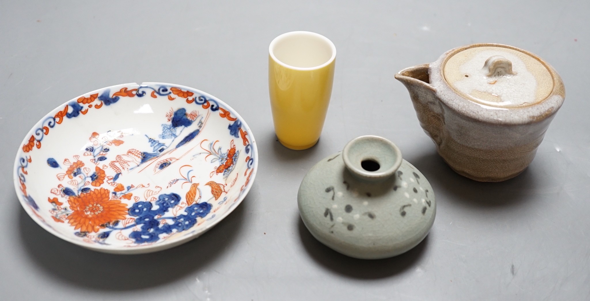 An 18th century Chinese Imari pattern saucer, a small Korean vase and two other pieces